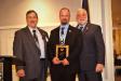 Gary Thorington (C), town of Windham, accepts an Executive Committee Award Plaque.