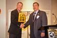 Todd Fiero (L), president of Henderson Products, receives the Vision Award from Incoming President Rich Benjamin.