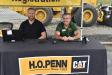 Scott Cortright (L) and John Murphy, both of H.O. Penn, welcome guests to Cat’s “Can You Dig It” event in Bloomingburg, N.Y.