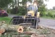 The town of Potsdam highway crew uses the new Cat 420 backhoe to clean-up after a July windstorm.
