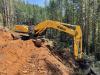 The Kobelco SK300 excavator helped create 1,880 ft. of new logging roads and 2,280 ft. of new logging tower landings for the project.