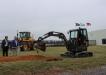 A Volvo ECR25 Electric compact excavator breaks ground on the new Volvo CE technician training center in Shippensburg, Pa. The facility will offer training on electric machine maintenance, among many other topics.