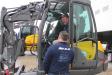 Geoffrey Andrews, product specialist and trainer of Mecalac, goes over the operation of an MCR compact skid excavator with a local contractor.