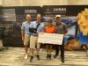 (L-R): Adam Tschetter and Edward Dobbs, both of Dobbs Equipment; Kristi Gibbs of Construction Angels; and Augusto Salles, also of Dobbs Equipment, are all smiles at the check presentation.
(Dobbs Equipment photo)