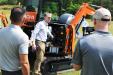 The press corps were all over the new machines with their cameras and video equipment as Hitachi’s Rob Orlowski (C) provides comprehensive machine walk-around demos of each of the three new excavator models.
(CEG photo)