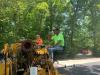 Pat Esposito, CEO, and Herbert (Lewie) Strickland, general foreman, perform paving work in the town of Kent. (Photo courtesy of the town of Kent highway department.)