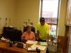Lori Rowe, highway department secretary, and Roger go over a grant that she recently wrote up.