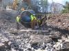 The crew works on a 5-ft. culvert replacement project.