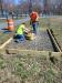 Brian Whalen and Andrew Holmes prepare a concrete slab for exercise equipment being installed at JH Ketcham park.