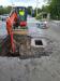 The town of Dover highway department repairs a dry well/catch basin on Railroad Avenue.