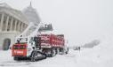 Bill Clark/CQ Roll Call photo
Capitol crews load snow into a dump truck in Washington, D.C. 