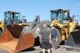 Chris Johnson (in cab) of Alta Equipment, Milford, Mich., tests out a Volvo L220 wheel loader. 