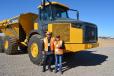 RDO Equipment Co.’s Phoenix sales professional, Teresa Reed (R) and Rob Cizek of CSW Contractors of Scottsdale, Ariz., admire the 410E articulated dump truck.
 