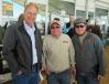 (L-R): In town from Verona, Ky., Rick Newman of Newman Tractor catches up with Jeff and Maxx Miller of Trophy Tractor, based in Dallas, Texas, at the IronPlanet/Cat Auction Services sale.
