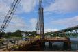 MaineDOT photo.
The contractor is constructing concrete roadway and railroad superstructures, a 300-ft. (91.44 m) -long steel lift span, four angular lift span towers and approach roads and intersections.
