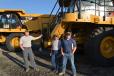 (L-R): Neal Davis, Jim Williamson and Ben Raffety of Barretts Minerals are on hand to bid on one of several Cat 775 rock trucks up for sale. Barretts operates a talc mine in Dillon, Mont.
 