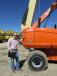 Enrique Cruz, EC Hauling LLC of Irving, Texas, made sure of the dimensions of this 600S JLG lift for hauling purposes.  