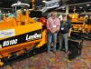 Ken Coulson (L) of Coulson Excavation, Loveland, Colo., has just had a presentation of the 8510C LeeBoy asphalt paver from Ken Black, president of McDonald Equipment Company in Commerce City, Colo. 