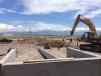 Big-D Construction photo
7
Salt Lake County is helping by covering part of the cost to build the storm drains and retention basin that is required, the relocation and installation of various utility lines, and the widening of adjacent roads to 