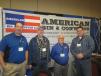Jerry Jones (second from left) of Hanson Material Service stops by the American Bin & Conveyor booth to see the latest product offerings. (L-R) are Jimmy Johnson, Jack Shecterle and Jeremy Curran, American Bin & Conveyor. 
 