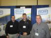 (L-R) are Nick Ford, Wirtgen Group/Kleemann, and Jeff Mikus and Mike Brunson, both of Roland Machinery Co. 
 