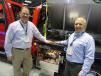 Dennis Roberts (L) and Len Puccio, both of DewEze Manufacturing, welcome attendees to their equipment display.
 