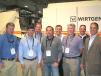 Sales staffers from Tractor & Equipment Company (TEC), based in Birmingham, Ala., joined their customers and Wirtgen representatives at World of Asphalt. (L-R) are Buddy Averett, Devaughn Pettit, and Brett Bussman of TEC; Brent Bazemore, Griffin Contracting, Pooler, Ga.; Mike Burris, Wirtgen America, Antioch, Tenn.; Richard Shore, TEC; Brett Armstrong, Wiregrass Construction Co., Montgomery, Ala.; and Autrey McMillan, TEC.   