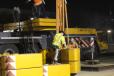 AGL Constructors photo.
Preparing the 600-ton (544.3 t) crane to place beams over the DART rail line. 