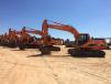 An assortment of Daewoo Hydraulic Excavators lined up ready for the auction in Florala, AL. 