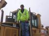 Mike Brown of the Maryland Department of Transportation, Hartford County, looks over a Caterpillar dozer. 
