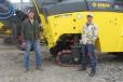 Jered Oman (L) and Mark Maloney Jr., both of Maloney Macadam Maintenance, Fleetwood, Pa., check out this Bomag BM 1200/35 cold milling machine. 