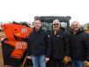 (L-R): Dan Olson, Scott Fahey and Randy Eckstein, all of Lano Equipment, stand with a Kubota SVL95-25. 