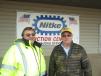 Prior to the start of the sale, Glenn Hewitt (L) of Northeast Asphalt stops by to speak with Leo Krivickas of Nitke auctions.
 