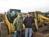 Lavaughn Coy (L) and Dan Kershner check out the skid steers and other compact equipment. 