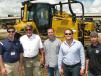 (L-R): Jonathan Holloway of Thompson Machinery talks with Jeff Browning, Ryan Browning, Bo Browning and Michael Howard, the owners of Browning Contractors Inc. of Collierville, Tenn., about this new Cat D6N LGP with grade control, which they plan to purchase.  