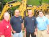(L-R): Scott Angel, Yancey Rents; Todd Westbrooks and Larry Loveland, Morrow Construction, Stockbridge, Ga.; and Nick Price, Yancey Rents, look over some of the rental units. 