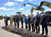 Foley held a ceremonial groundbreaking May 3 on the site of one of the new buildings. 