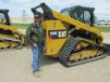 Phil Rasnake, Woodhams Equipment of Wayland, Mich., came a long way to bid on this Cat 279 D skid steer at the Texas Motor Speedway Grand Ballroom.
 