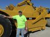 Dan Day of S&D Erectors, Farmersville, Texas, hopes to use this Cat 615C scraper for an upcoming project. 
 