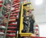 Russ King, Columbus Equipment Company, deploys a Hyster Reach truck fork lift to fill a parts order during the event. 
 