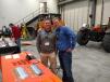 Bud McCollum (L), JLG representative, and Dustin Ronke, rental operations manager, Titan Machinery, Omaha, attend the event.  