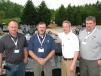 Allen Tennis (2nd from L), regional representative of FAE USA, talks with some of his Midwest dealers from Titan Machinery, including (L to R): Mark Huselid, Ben Carlson and Mike Ludwig. 