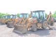 Many backhoe loaders were available to the highest bidder. 