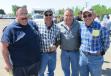 (L-R): Chip Wibright of Mechanicsburg Sand and Gravel; Pat Paykoff of Straight Up Equipment Company; Mike Culbertson of Mike’s Trucking; and Tom Dew of Tom Dew Excavating; share  some laughs at the auction.
 
