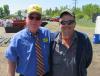 Frank Boback (L), Petrowsky Auctioneers territory manager, catches up with Tim Shaw of Shaw & Holter Inc.
 