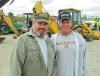 Rick Hohenbrink (L) of Hohenbrink Excavating, talks with Andy Heer of AWH Enterprises at the auction. 