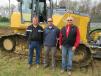 (L-R): Dave Russell, Chris Mears and Greg Fausel, all of Murphy Tractor and Equipment, present a John Deere 850K dozer equipped with Topcon’s 3DMC2 system to attendees.
 