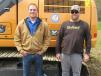 Chris Morgan (L) of Southeast Equipment Company talks with Kirk Scheid of Sheid Enterprises about this Case excavator equipped with the UBEXi  iDig wireless bucket position indicator. 