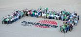 Brand in the sand: Powerscreen hosted a world dealer conference in Florida in 2014, this is a selection of dealers and customers from around the world who attended. 