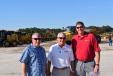(L-R): Tom Couser, Equipment Corp.; Scott Linder, IronPlanet; and Jamie Wurthmann of UCM take a break from the auction. 